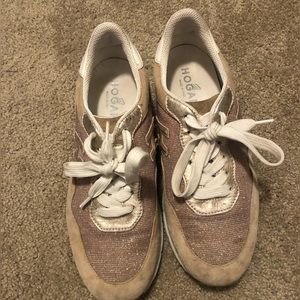 Hogan tennis shoe with pretty rose gold textured detail and a nude suede trim.